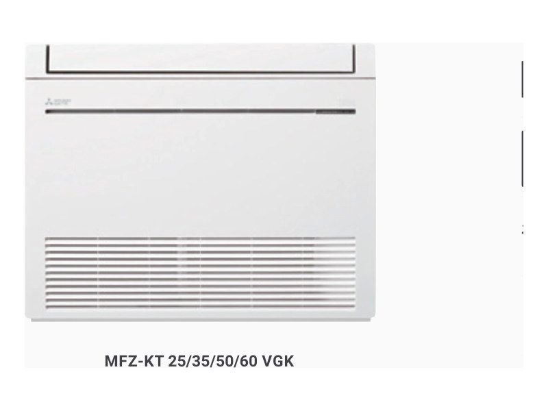 Console Mitsubishi Electric MFZ-KT posée en bas d’un mur clair, à côté d’un canapé écru.