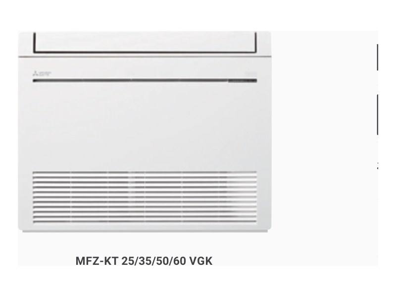 Console Mitsubishi Electric MFZ-KT posée en bas d’un mur clair, à côté d’un canapé écru.